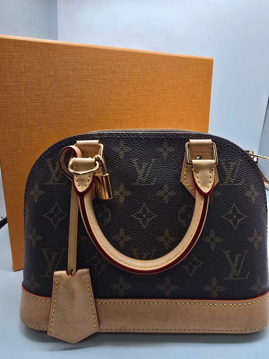 Louis Vuitton Alma BB Bag canvas with natural vachetta leather trim and gold-tone hardware, Grade B