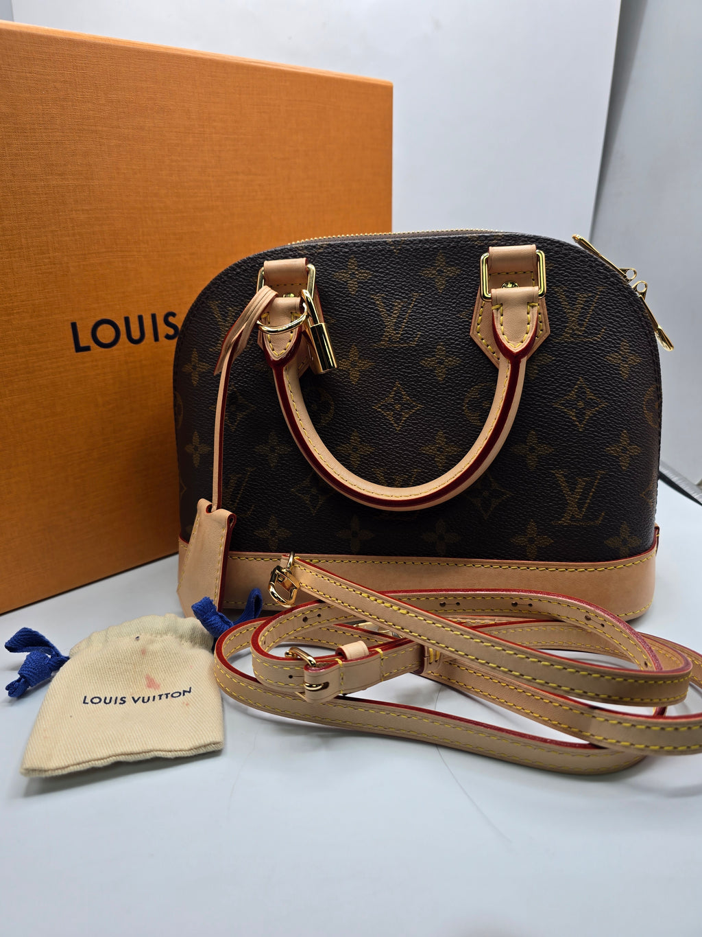 Louis Vuitton Alma BB Bag canvas with natural vachetta leather trim and gold-tone hardware, Grade B