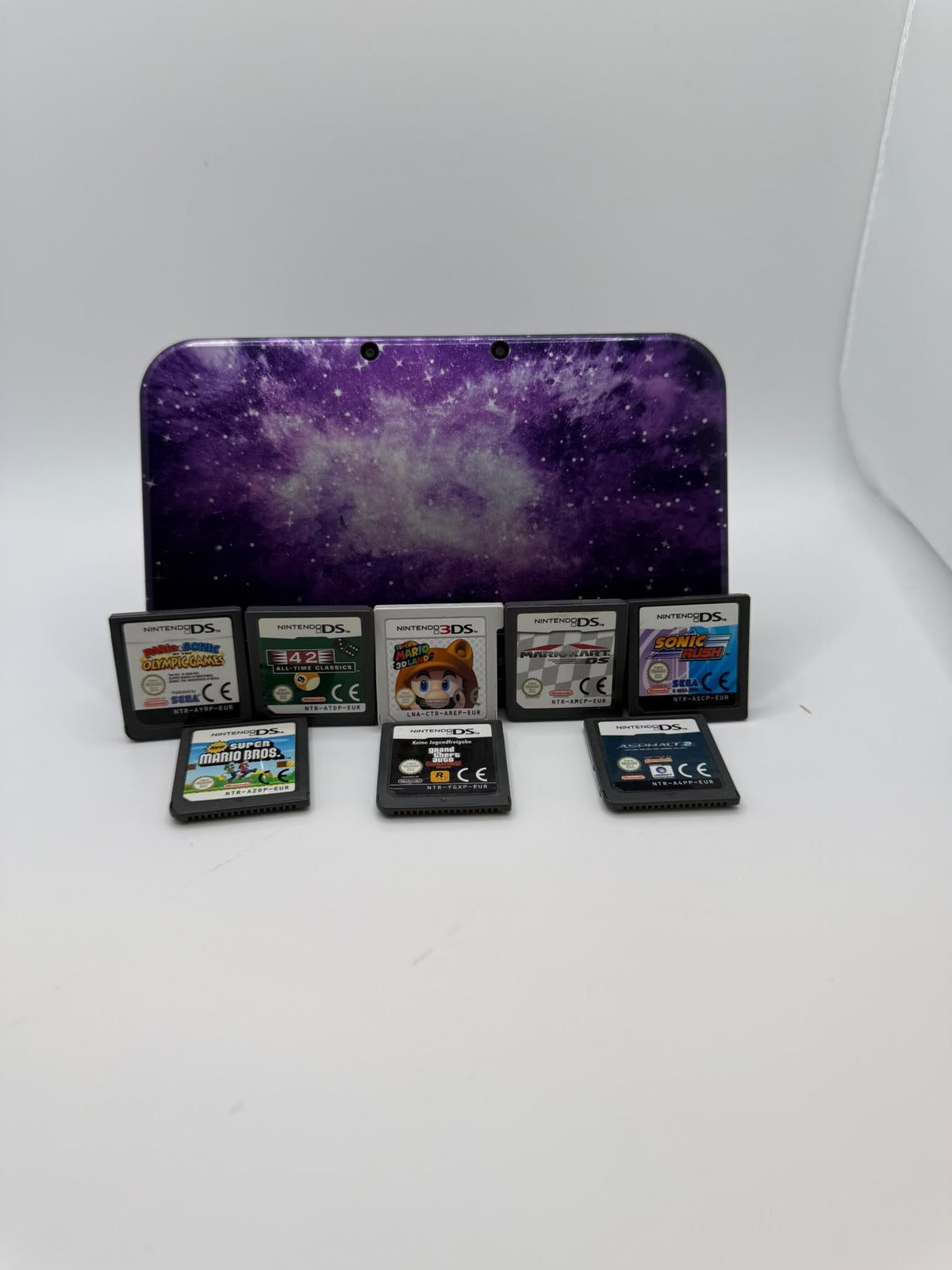 “New” Nintendo 3DS XL Limited Edition Galaxy Style + 8 Games, Grade B