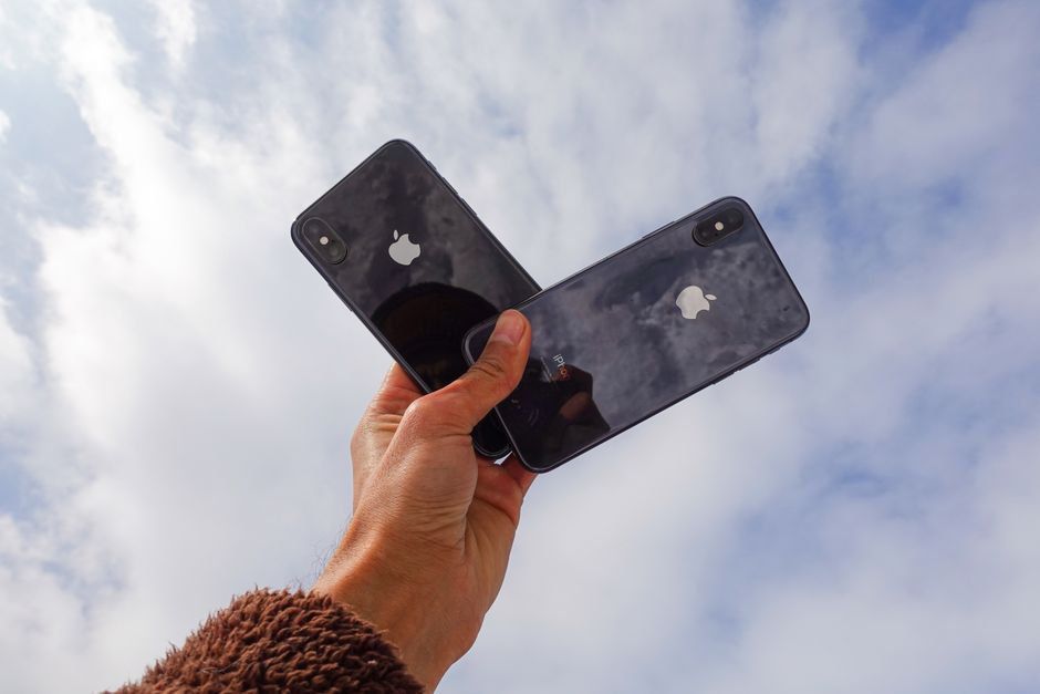 iPhones — stock photo by Rubaitul Azad via Pexels (https://www.pexels.com/photo/close-up-photo-of-a-person-holding-cellphones-11374459/)