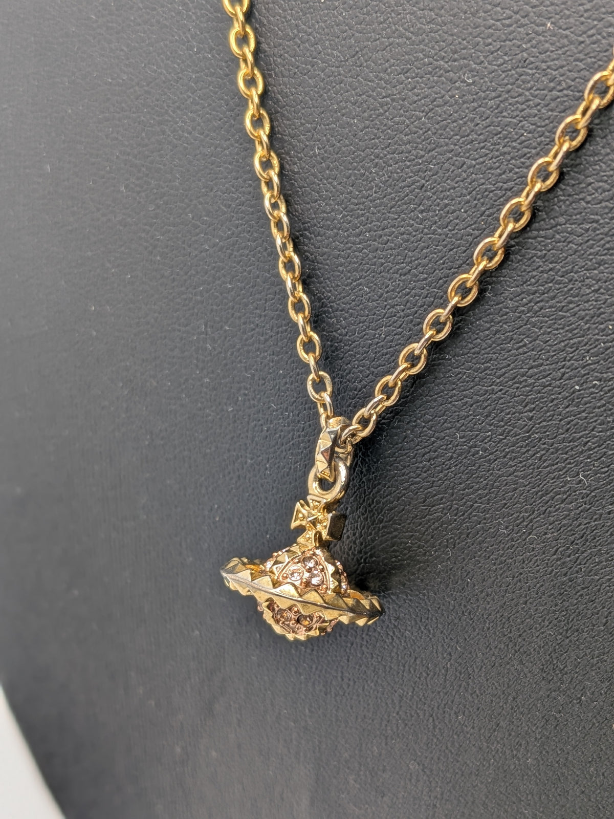 Vivienne Westwood Gold-tone Pendant necklace with a Pink Crystal Embellished Saturn Orb charm, Grade B