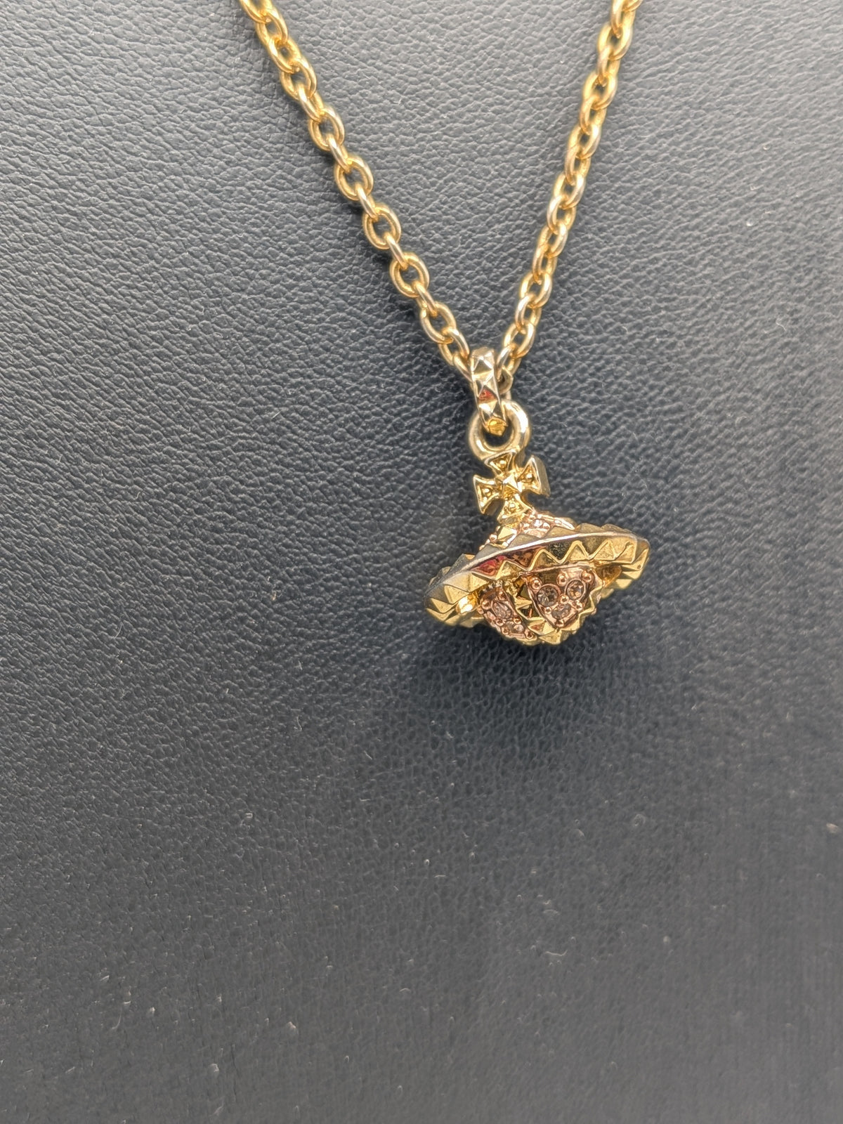 Vivienne Westwood Gold-tone Pendant necklace with a Pink Crystal Embellished Saturn Orb charm, Grade B
